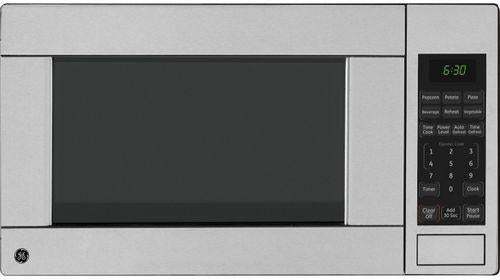 1.1 cu. ft. Countertop Microwave Oven with 1,100 Cooking Watts &amp; Child Lockout: Stainless Steel - FAMSA Furniture (TX)