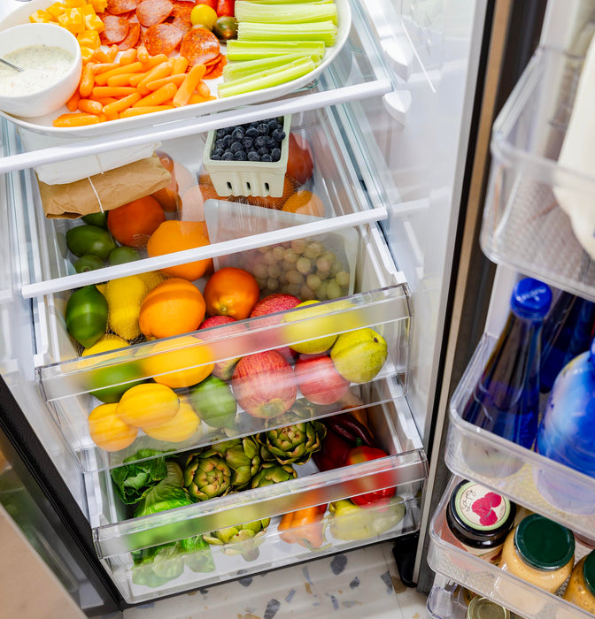 GE® 23.5 Cu. Ft. Counter-Depth Side-By-Side Refrigerator with LED Light Walls and Extra Tall Dispenser GZS24PYYFS