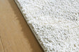 Unawick Large Rug - FAMSA Furniture (TX)
