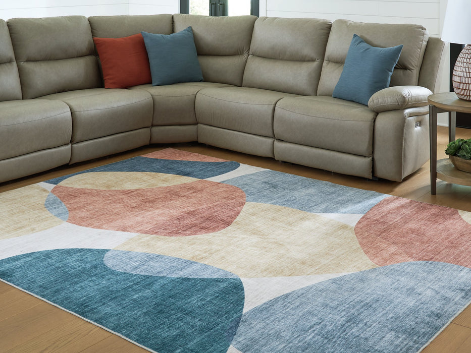 Chanleigh Washable 7'6" x 9'6" Area Rug - FAMSA Furniture (TX)