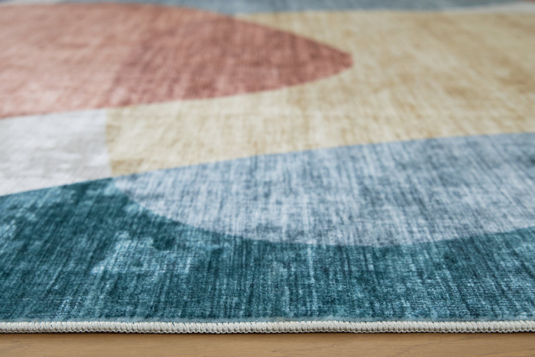 Chanleigh Washable 7'6" x 9'6" Area Rug - FAMSA Furniture (TX)