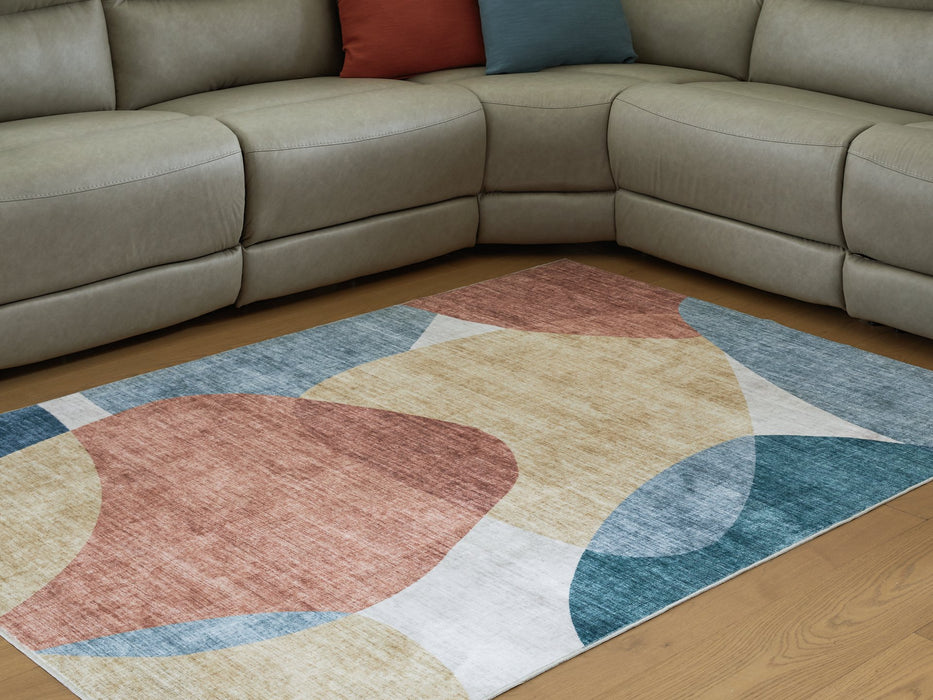 Chanleigh Washable 5' x 7' Area Rug - FAMSA Furniture (TX)