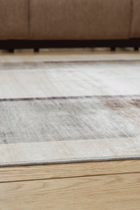 Larkport Washable Area Rug - FAMSA Furniture (TX)
