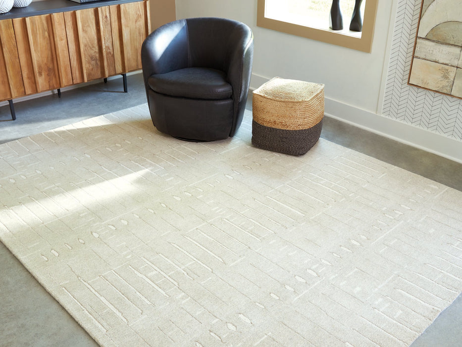 Wolbert 7'8" x 10' Area Rug - FAMSA Furniture (TX)
