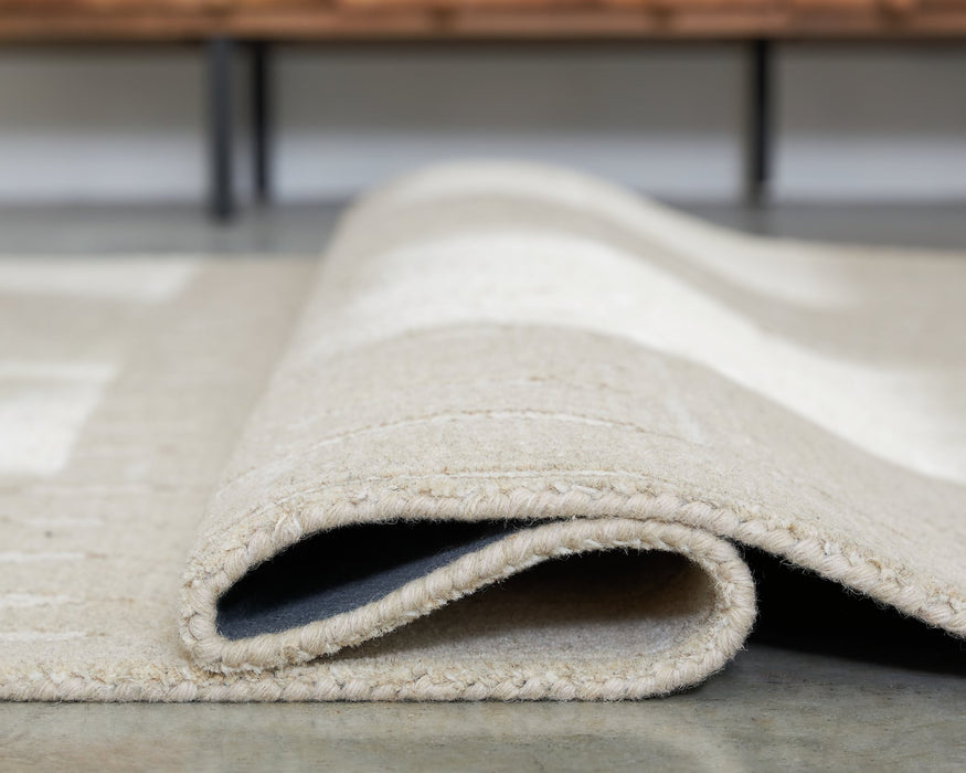 Wolbert 7'8" x 10' Area Rug - FAMSA Furniture (TX)