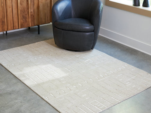 Wolbert 5' x 7' Area Rug - FAMSA Furniture (TX)